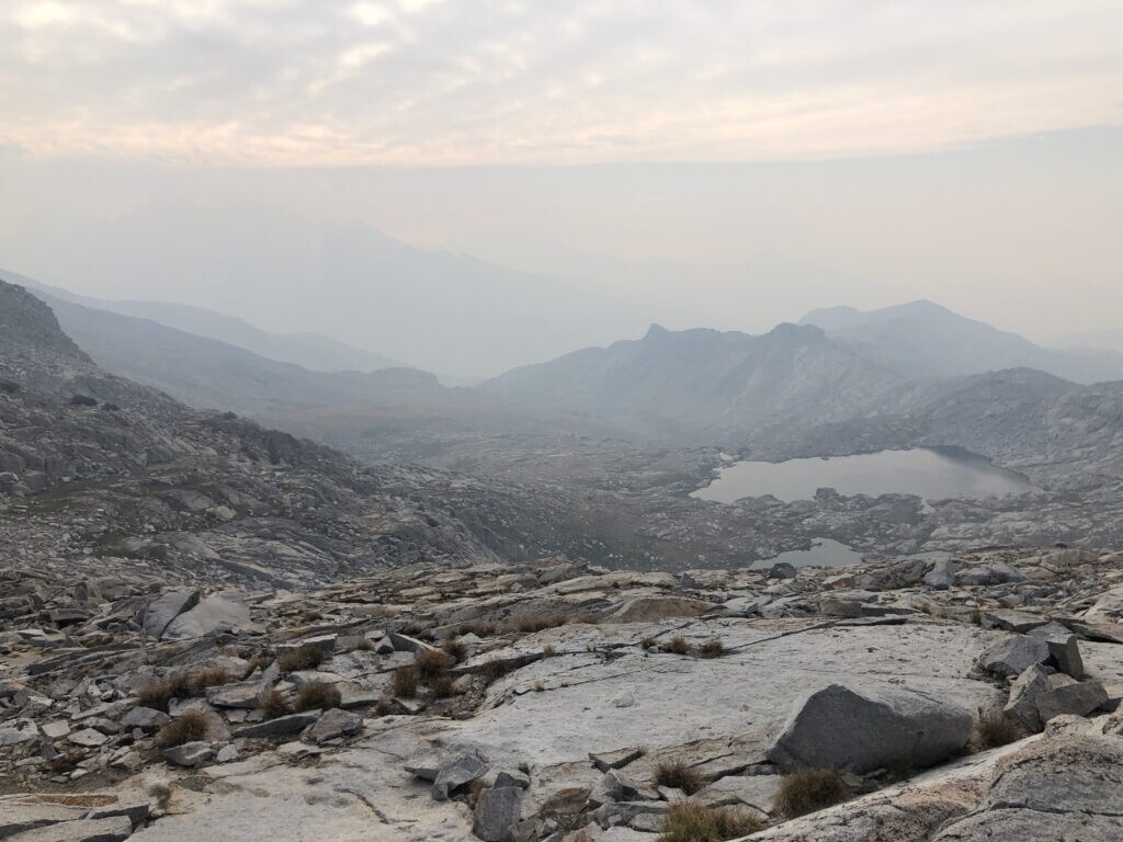 distant mountains obscured by smoke
